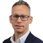 A headshot of Simon Burchell.